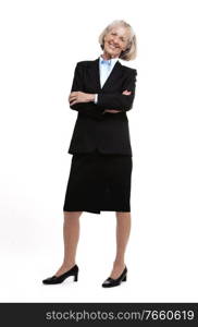 Portrait of senior businesswoman standing in suit 