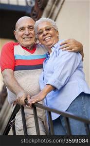 Portrait of senior couple embracing, low angle view