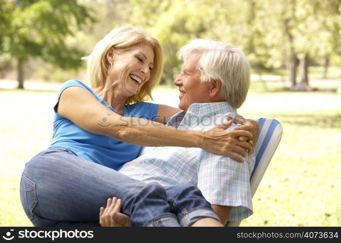 Portrait Of Senior Couple Enjoying Day In Park