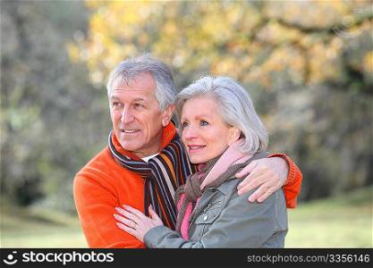 Portrait of senior couple in countryside