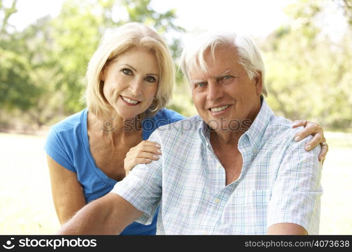 Portrait Of Senior Couple In Park