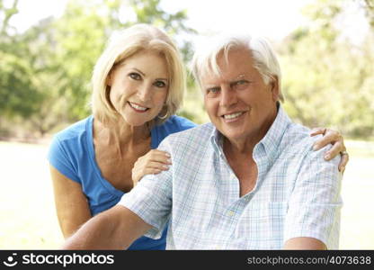 Portrait Of Senior Couple In Park