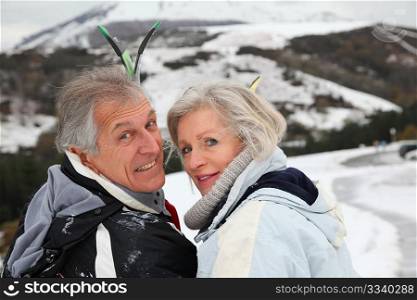 Portrait of senior couple in ski resort