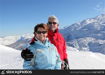 Portrait of senior couple in winter holidays