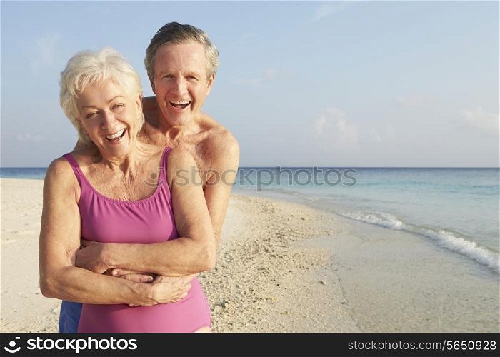 Portrait Of Senior Couple On Tropical Beach Holiday