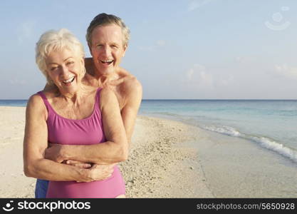 Portrait Of Senior Couple On Tropical Beach Holiday