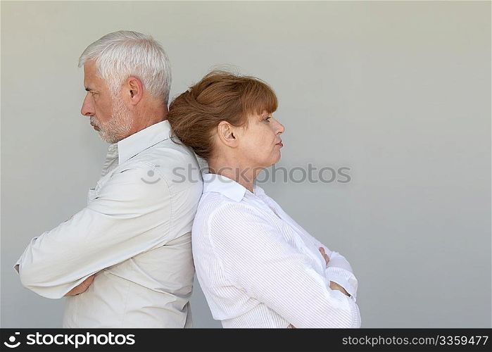 Portrait of senior couple upset at each other