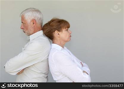 Portrait of senior couple upset at each other