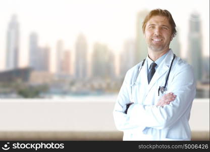 Portrait of senior doctor in hospital room