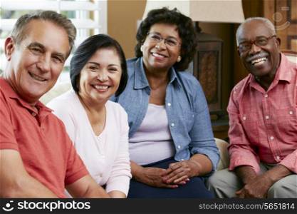 Portrait Of Senior Friends At Home Together