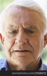 Portrait Of Senior Man Looking Anxious