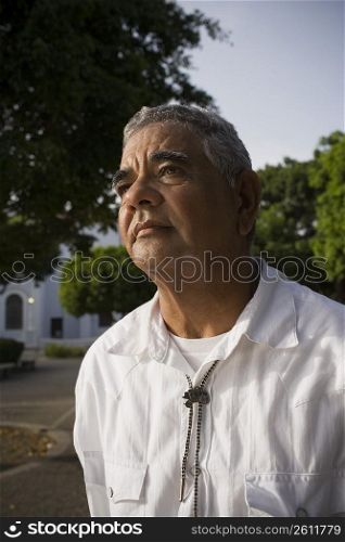 Portrait of senior man, outdoors