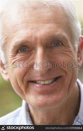 Portrait Of Senior Man Smiling At The Camera
