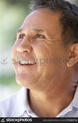 Portrait Of Senior Man Smiling Happily
