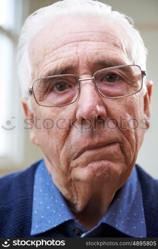 Portrait Of Senior Man Suffering From Stroke