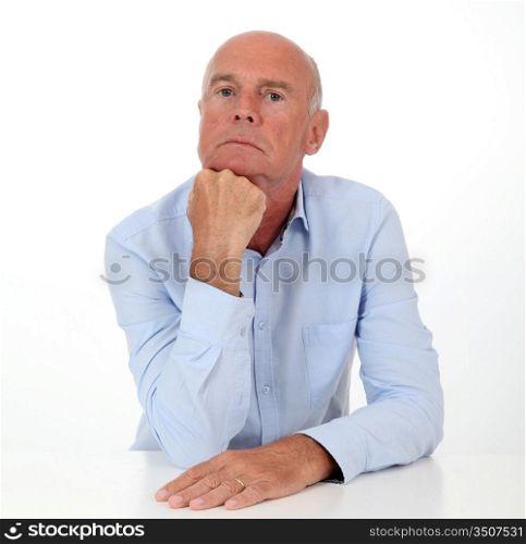 Portrait of senior man with serious look