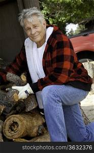 Portrait of senior man working at lumber industry