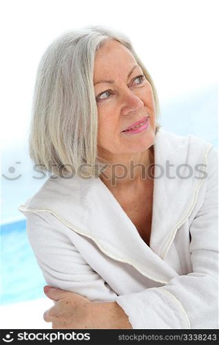 Portrait of senior woman in bathrobe