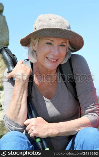 Portrait of senior woman in hiking outfit