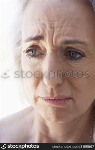 Portrait Of Senior Woman Looking Anxious