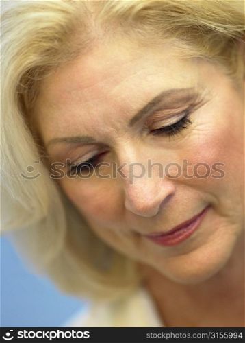 Portrait Of Senior Woman Looking Down