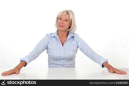 Portrait of senior woman showing satisfaction
