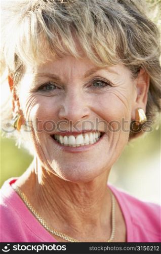 Portrait Of Senior Woman Smiling At The Camera