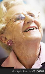 Portrait Of Senior Woman Smiling Happily