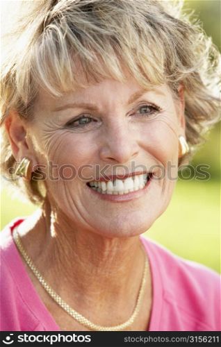 Portrait Of Senior Woman Smiling Happily