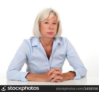 Portrait of senior woman with bored expression