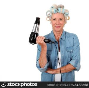 Portrait of senior woman with hair-curlers
