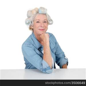 Portrait of senior woman with hair curlers