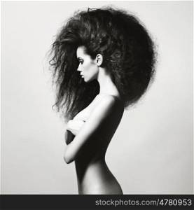 Portrait of sensual woman with magnificent bushy hair
