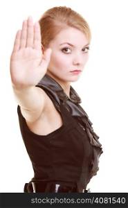 Portrait of serious businesswoman blonde businesswoman in black showing no stop hand sign gesture isolated on white.