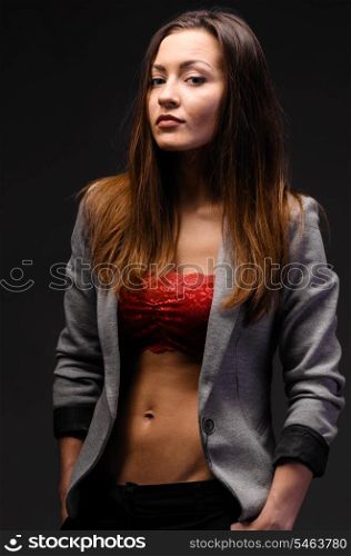 Portrait of sexy business woman on gray background. sexy business woman