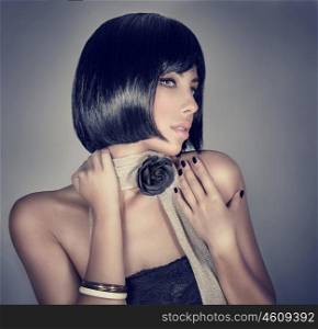 Portrait of sexy woman isolated on gray background, retro style fashion look, gorgeous hairdo and stylish makeup, luxury beauty salon