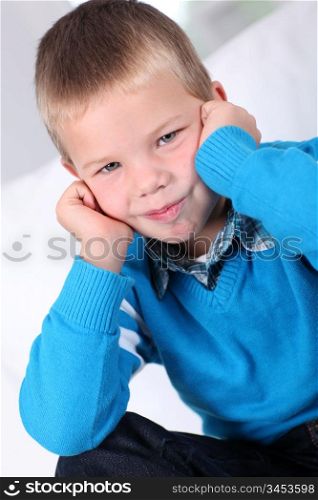 Portrait of shy little boy
