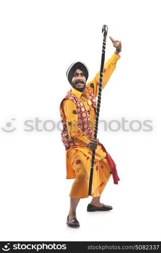 Portrait of Sikh man doing bhangra dance