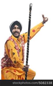 Portrait of Sikh man doing bhangra dance