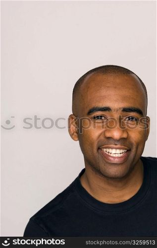 Portrait of smiling African-American man.