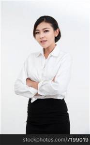 Portrait of smiling and happy asian businesswoman standing with arms folded and looking at camera dress in black suit isolated on white background