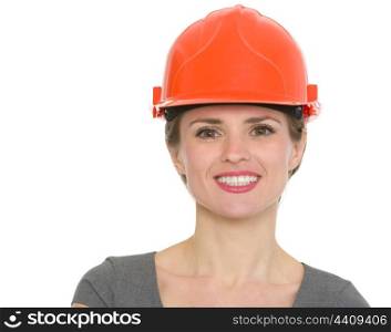 Portrait of smiling architect woman in helmet. HQ photo. Not oversharpened. Not oversaturated. Portrait of smiling architect woman in helmet isolated