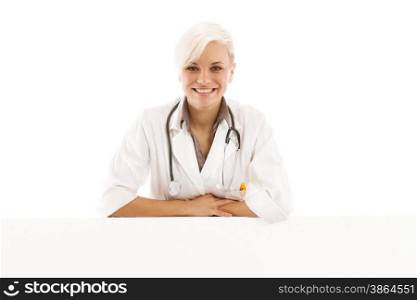 Portrait of smiling blonde female doctor over white isolated background