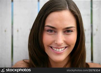 Portrait of smiling brown-haired woman
