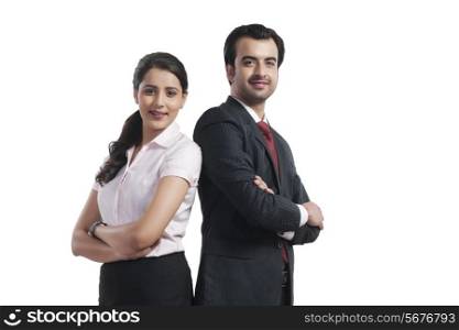 Portrait of smiling business colleagues standing arms crossed over white background