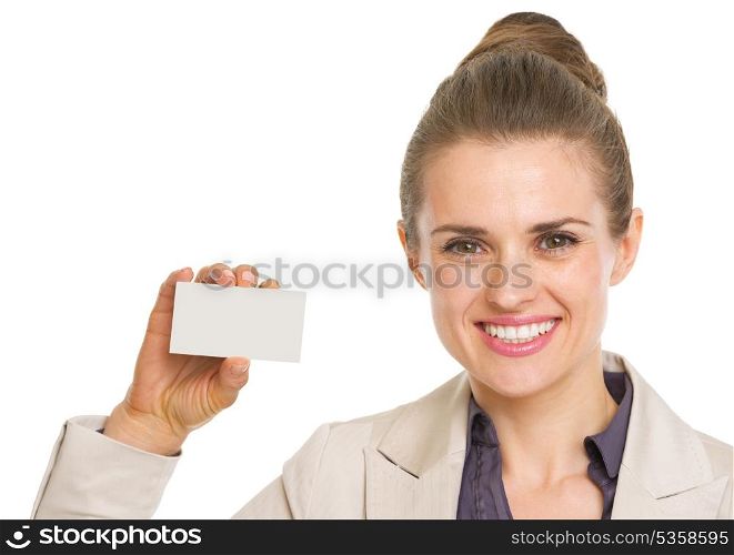 Portrait of smiling business woman showing business card