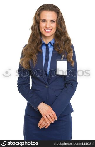 Portrait of smiling business woman with badge