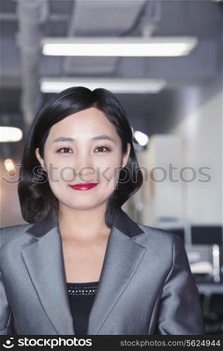 Portrait of smiling businesswoman in Beijing