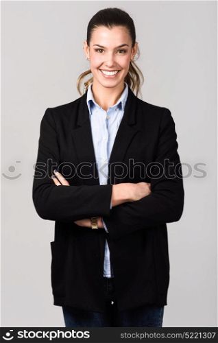 Portrait of smiling businesswoman. Studio shot