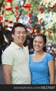 Portrait Of Smiling Couple In Nanluoguxiang, Beijing